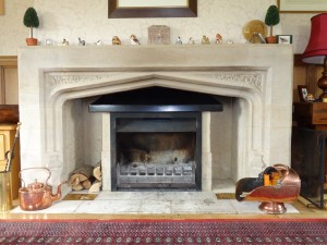 jetmaster tastefully inserted in stone fire place