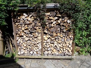 A well built fire wood shed basking in the sun