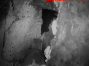 missing brick in flue revealing a hole behind